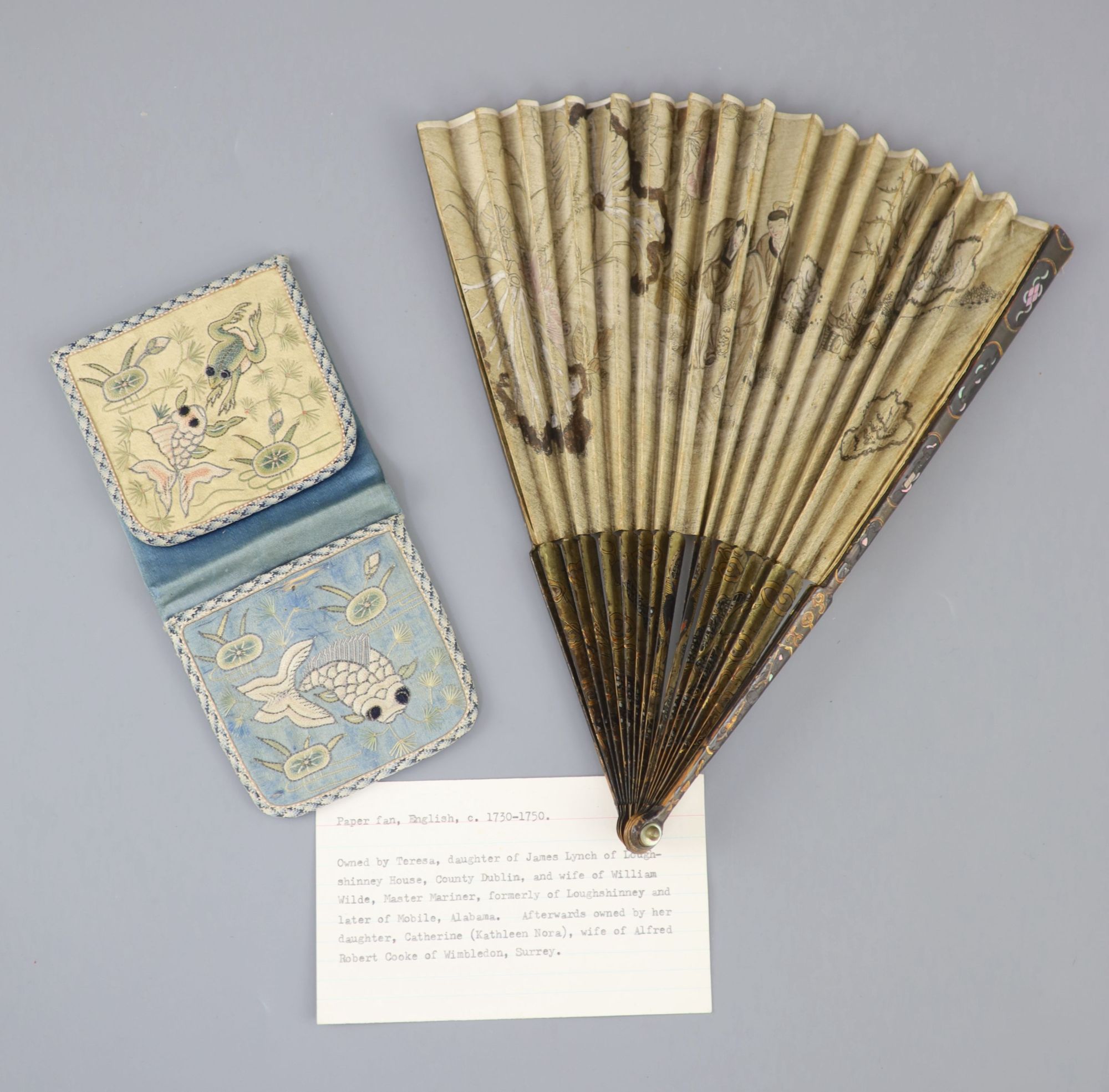 An English painted paper and lacquer fan, late 18th century and a 19th century Chinese embroidered silk purse